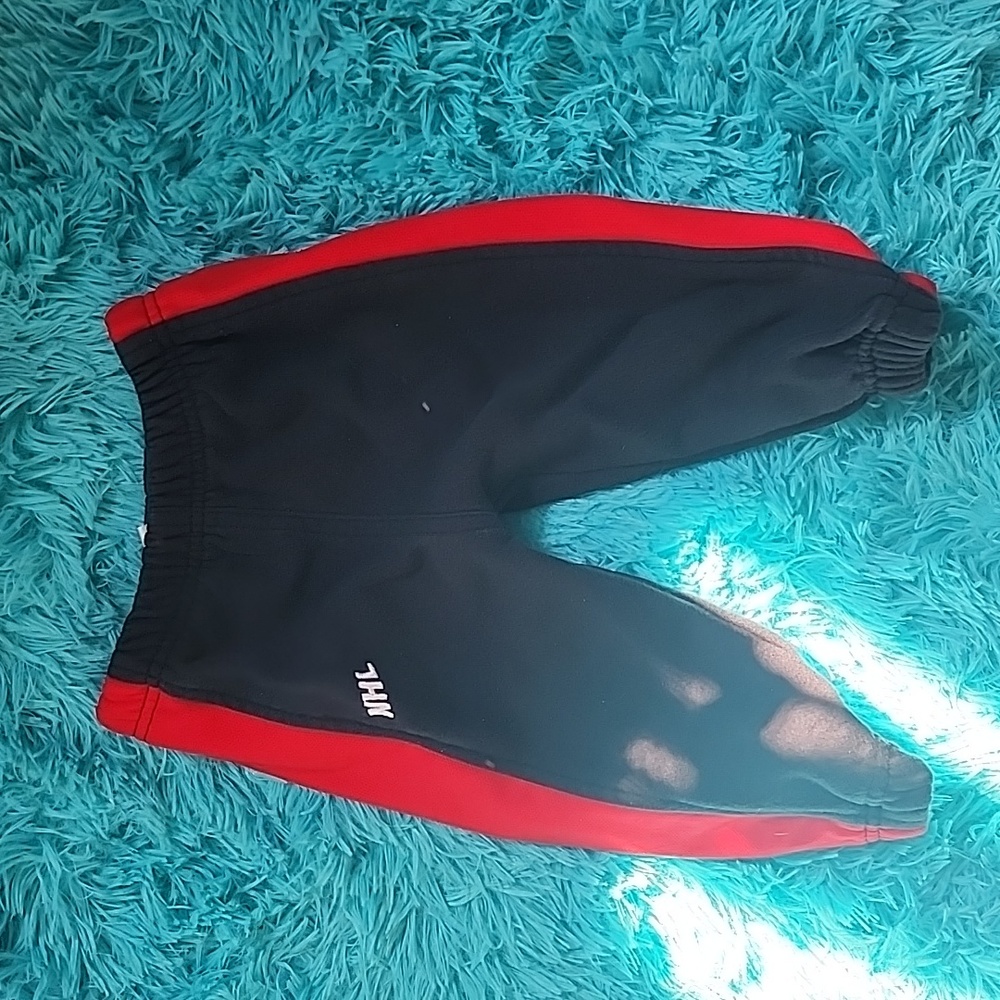 Black and red 12 months NFL sweatpants
